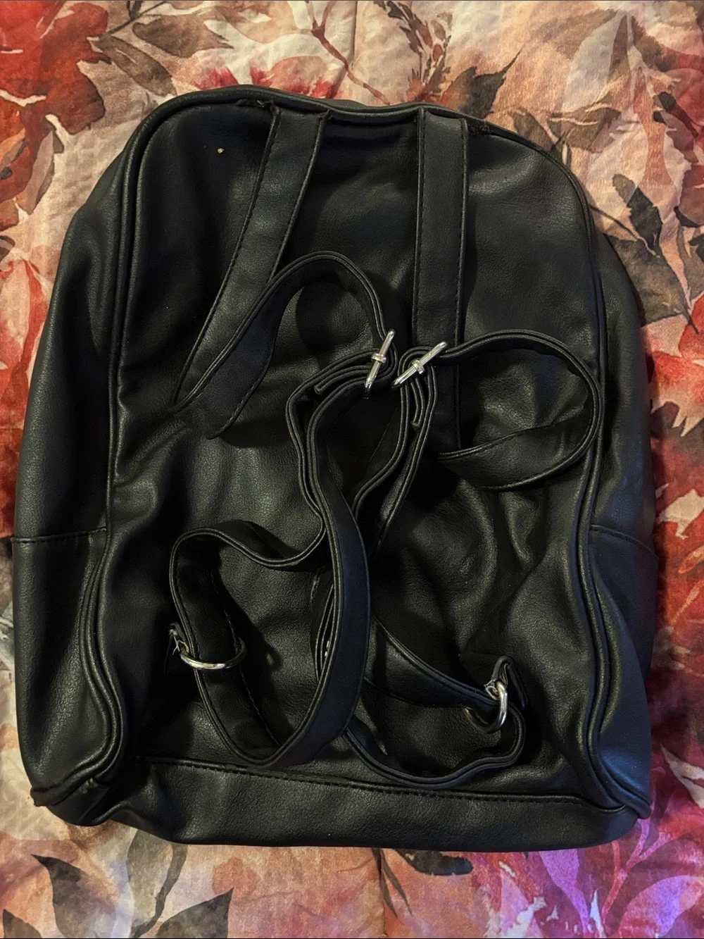Woman’s Black Faux Leather Small Backpack